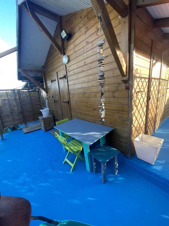 Duo d’appartement séparé par un couloir situé au bord de la mer Le Moule Extérieur photo